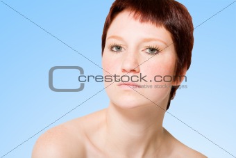 Studio portrait of an uptight young woman with short hair 