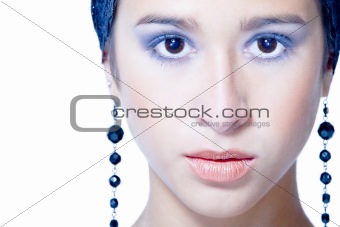 Mixed raced young beauty with earrings