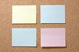 Colorful post-it notes on corkboard