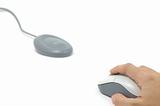 Hand on wireless mouse and receiver