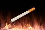 Isolated Cigarette on a Fire Background