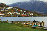 Village over norwegian fjord