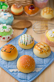 sweet vanilla bun cake bread with pastry decorations as backgrou