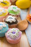 beautiful cup cakes muffins with baking background