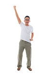 chinese male celebrating in success standing with funny expressi