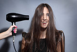 girl with hairdryer
