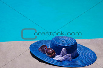 Women's stuff by the swimming pool