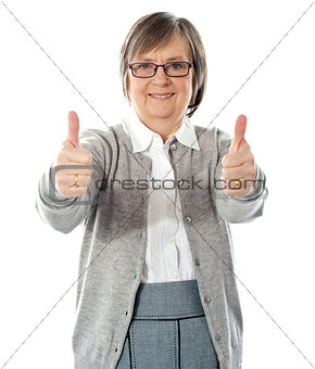 Woman with double thumbs-up