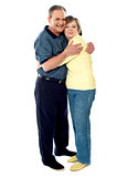 Portrait of happy couple hugging