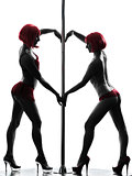 two women pole dancer silhouette