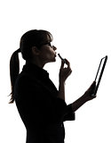 business woman applying lipstick computer computing  digital tab