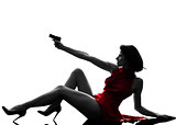 sexy woman holding gun  silhouette