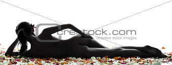 rear view of beautiful asian woman naked with flowers petal silh