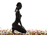 beautiful asian woman naked with flowers petal silhouette