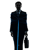 business man tied up prisoner silhouette