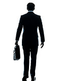 business man walking rear view silhouette