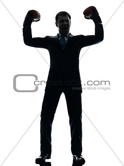 business man with boxing gloves  silhouette