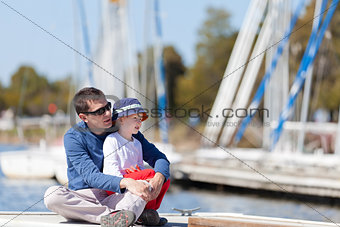 family at a marina dock