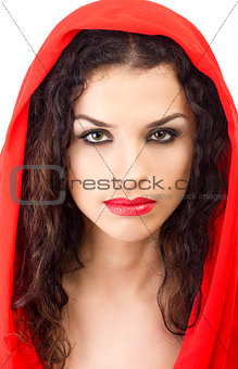 Young woman in red hood with red lips