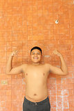 Thai boy muscle flexing