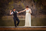 Smiling Cople Dancing Over Pond