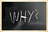 "Why" handwritten with white chalk on a blackboard