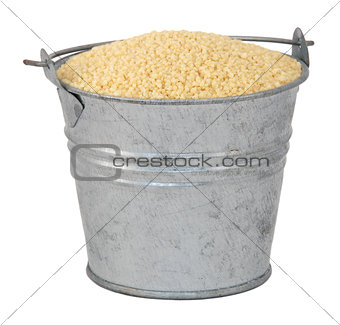 Cous cous in a miniature metal bucket