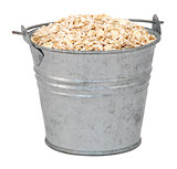 Porridge oats in a miniature metal bucket