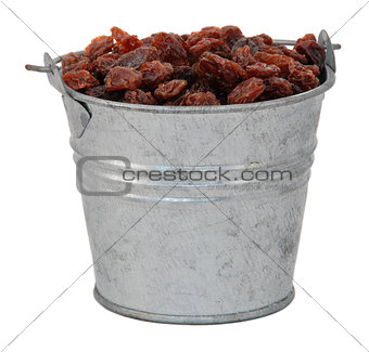 Raisins in a miniature metal bucket