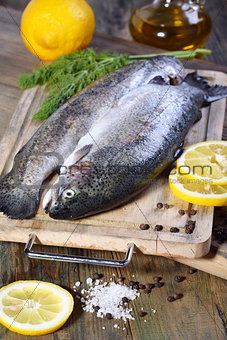 Trout on a cutting board.