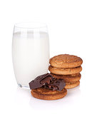 Glass of milk, cookies and chocolate