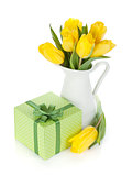 Yellow tulips and gift box