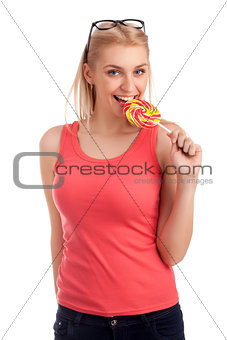 Portrait of beautiful girl with big lollipop