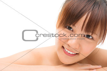 Asian skincare woman lying on front