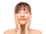Asian skincare woman pampering face skin