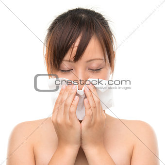 Flu or cold - sneezing woman sick blowing nose. 