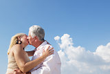 Active retired people, romantic elderly couple in love and kissi