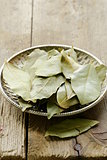 Dried bay leaves on a silver plate