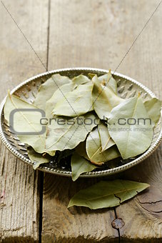 Dried bay leaves on a silver plate