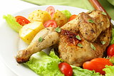 fried chicken with salad and vegetables