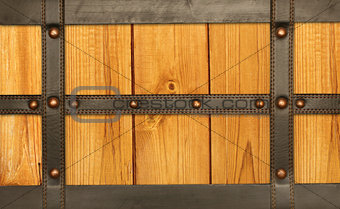 Leather belt and wooden plank