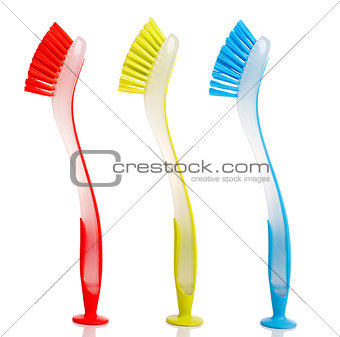 Colour dish washing brushes