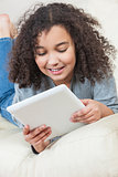 Mixed Race African American Girl Using Tablet Computer