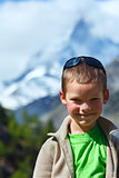 Boy and summer Matterhorh mountain, Alps