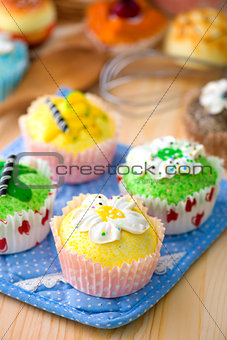 cup cakes with a lot of bread pastry background