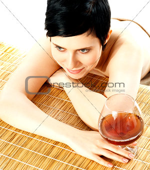 Spa woman relaxing with a wine glass