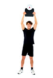 Male athlete holding weighing machine over his head