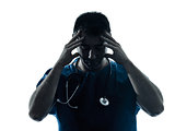 doctor man tired headache silhouette portrait