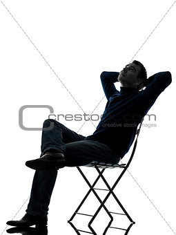 man sitting resting looking up silhouette full length
