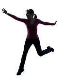 woman happy running jumping silhouette